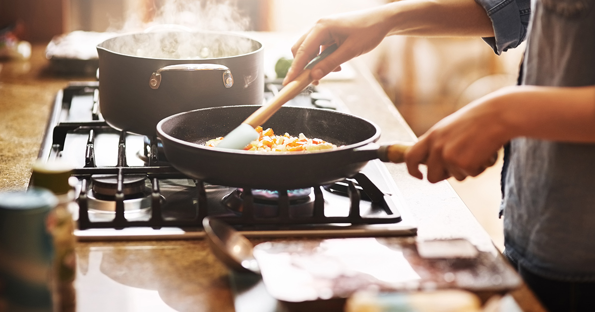 Photo Using energy to cook