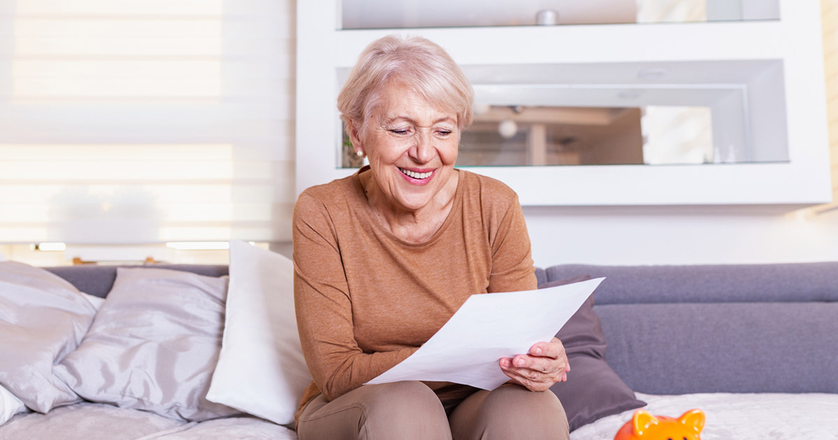 Woman reviewing her electricity bill.